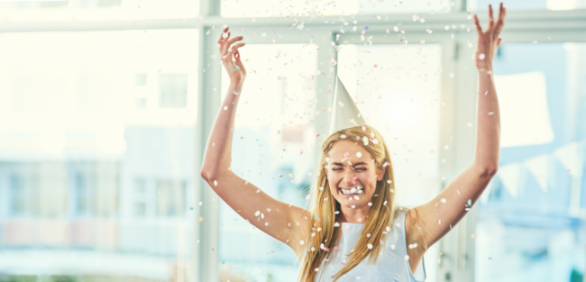 Happy Holidays a person with confetti showers