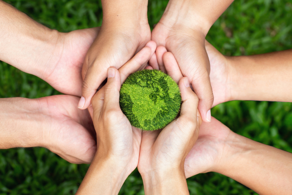 Blogpost-Image-Earth-Day Environment Earth day. Hands holding together a green earth
