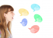 a woman facing sideways talking with a bubble speech graphic coming out of her mouth