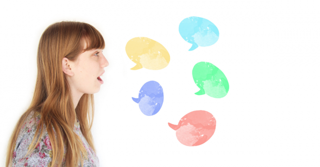 Language-Barriers-1 a woman facing sideways talking with a bubble speech graphic coming out of her mouth