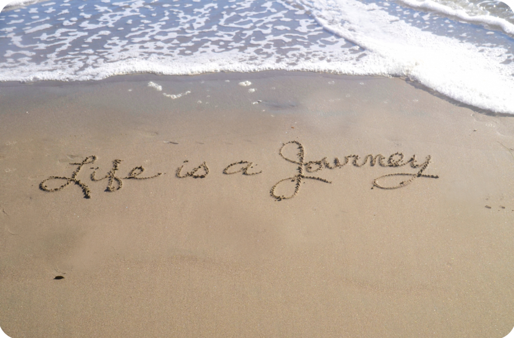 writing in sand that reads, "Life is a Journey."