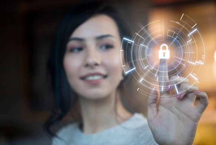 Blog-Scam Alert-2 A women touching a digital padlock with her fingertip